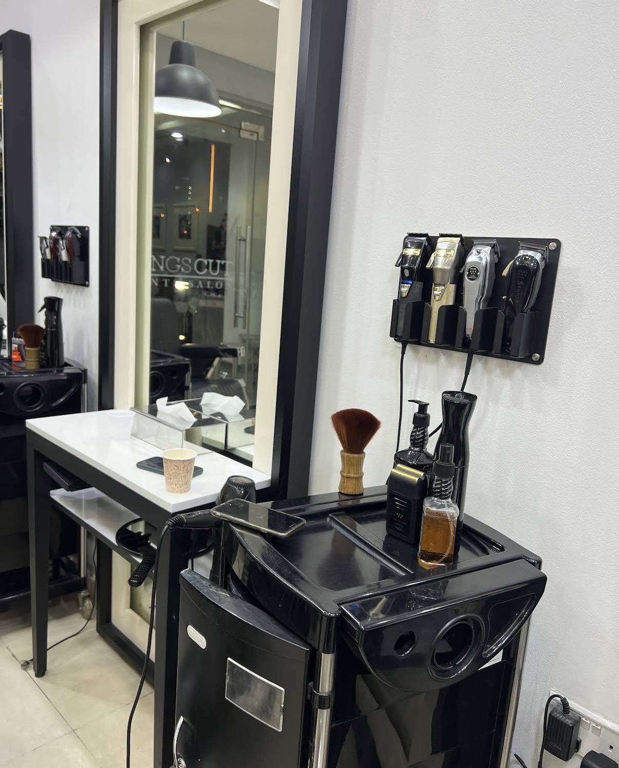Professional grooming tools laid out at the station
